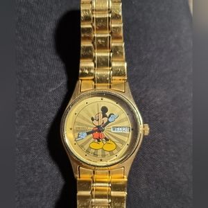 Seiko Mickey Mouse Starburst Watch for PARTS.  The guts are bad. Battery leaked.